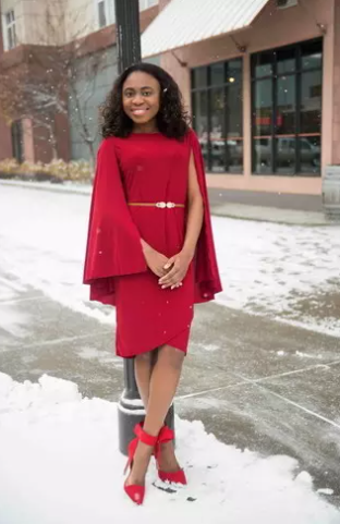 Bold and confident in red sheath dress