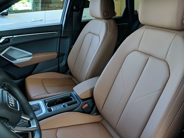 The interior view of Audi Q3 2021 Premium.