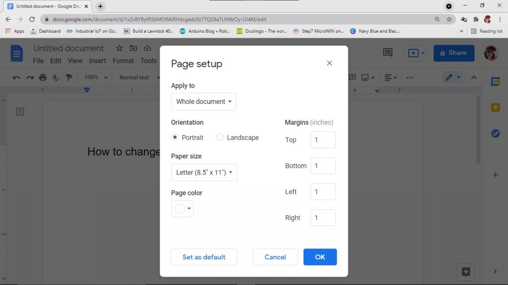 Give the values you desire on the boxes under margin to change margins in Google Docs.